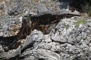 rocks along the shore, lines, asymmetrical, photo