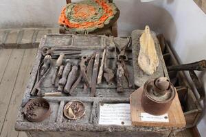 old tools of a shoemaker photo