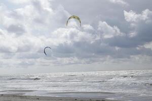 cloudscape, village petten at the north sea, the netherlands, photo