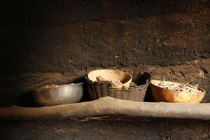 bowls with food in a tata somba house photo