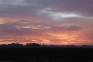 cloudy sunrise in the netherlands photo