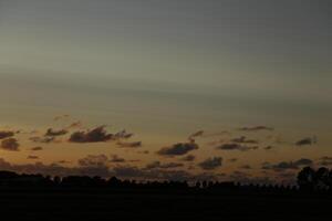 sunset in the netherlands, clouds, colors photo