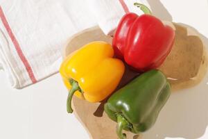 three colors bell pepper, red, green, yellow photo