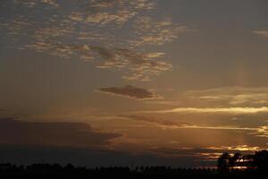 sunset in the netherlands, clouds, colors photo