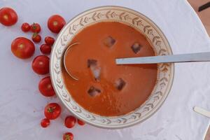 gazpacho soup, a cold spanish tomato soup, eaten in the summer in spain photo