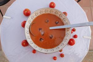 gazpacho soup, a cold spanish tomato soup, eaten in the summer in spain photo