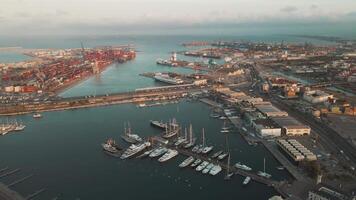 Tranquil Sunset Over Marina With Docked Yachts in Bustling Port City video