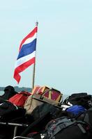 thai flag, suitcases, traveling, Koh Samui island, Thailand photo