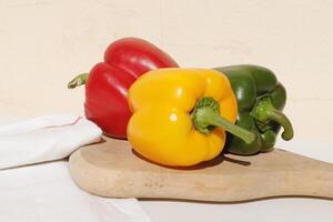 three colors bell pepper, red, green, yellow photo