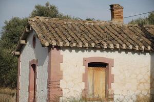 ruin of a house in the mountains photo