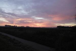 cloudy sunrise in the netherlands photo