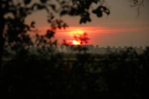 sunset in the netherlands, clouds, colors photo