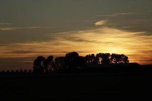 sunset in the netherlands, clouds, colors photo