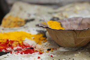 colorful powders to make mandalas on the streets, use for tikka, holi, and many other hindi events photo