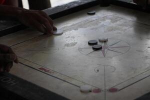 men play a board game photo