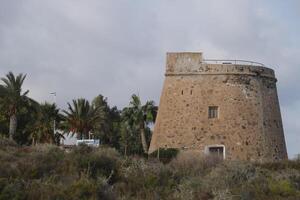 old watchtower at the beach photo