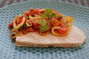 tuna with tomato sauce and capers photo