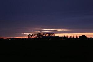 sunset in the netherlands, clouds, colors photo