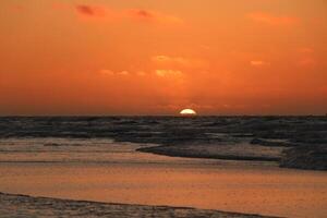 colorful sunset at Vlieland a dutch island photo