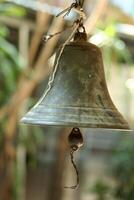 bell in a buddhist monastery, thailand photo