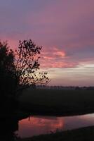 cloudy sunrise in the netherlands photo