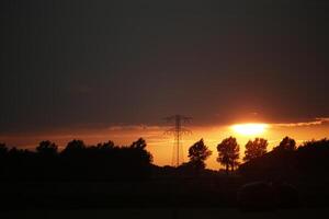 sunset in the netherlands, clouds, colors photo