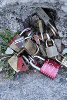 turned out into a tradition for lovers, put a padlock on a stone, fence or something else photo