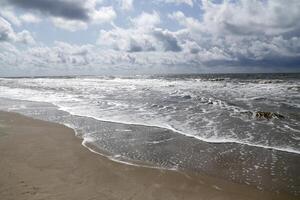 rough sea, village petten at the north sea, the netherlands, photo