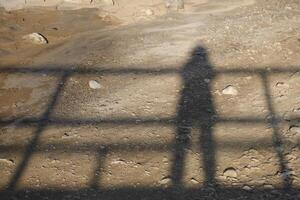 shadow of a woman with abstract asymmetrical lines photo