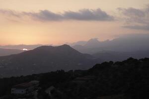 sunrise in the mountains of periana, spain photo