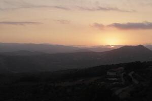 sunrise in the mountains of periana, spain photo