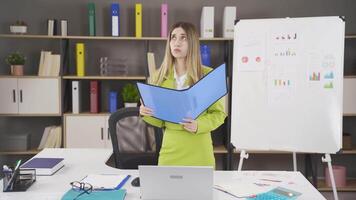 Thoughtful businesswoman in her office. video