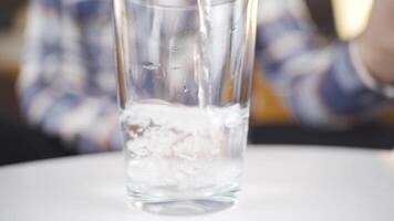 Close-up of a glass of water, its bubbles. video