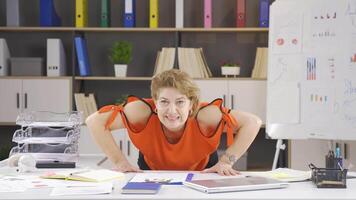 Woman exercising at work. video