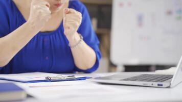 Angry businesswoman banging fist, table. video