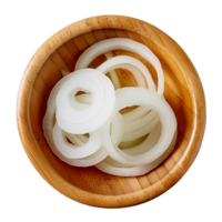 finamente rebanado cebollas en un tradicional de madera cuenco png