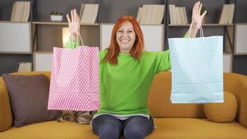 Happy woman returning from shopping. video