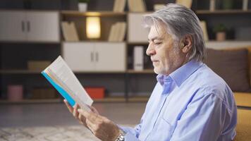 Old man who likes to read books. video