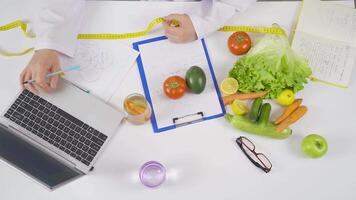 Dietitian using tape measure. video