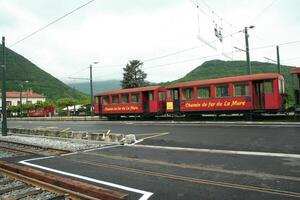 old railway station with old train photo