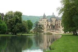 castle at lake in france photo