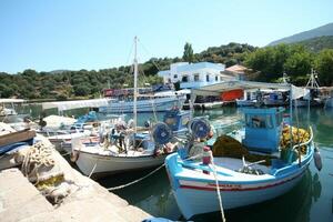 cosy harbor in a village of lesbos, greece photo