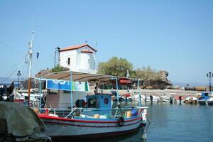 cosy harbor in a village of lesbos, greece photo