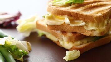 fried toasts with filling, salad leaves, tomatoes video