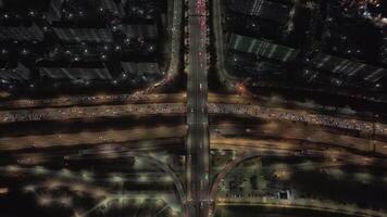 Seoul's night traffic vibrant artery of Asian metropolis aerial top view Rhythm of Seoul's night traffic captures essence of city life. Seoul's night traffic nocturnal beauty of South Korea capital. video