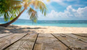 A wooden table on a tropical beach with palm trees and blue water. photo