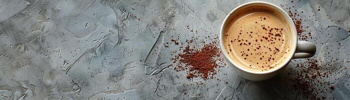 White cup of coffee on a gray concrete background. photo