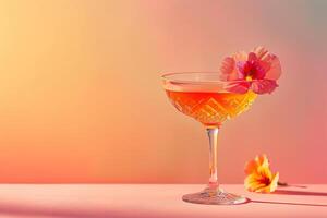 A beautiful cocktail with a flower on the rim of the glass, sitting on a pink table with a pink and orange background. photo