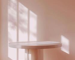 A pink table against a pink background with shadows of leaves on the wall. photo