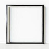 Black picture frame on white background photo